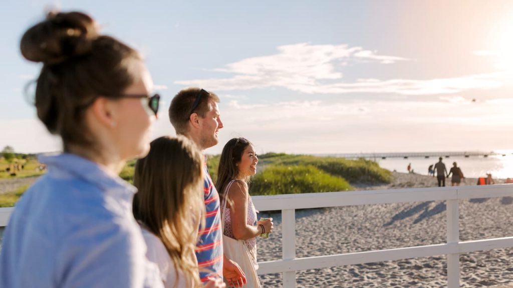 A group of adults at the beach after receiving mental health outpatient treatment from Pennsylvania Counseling Services.