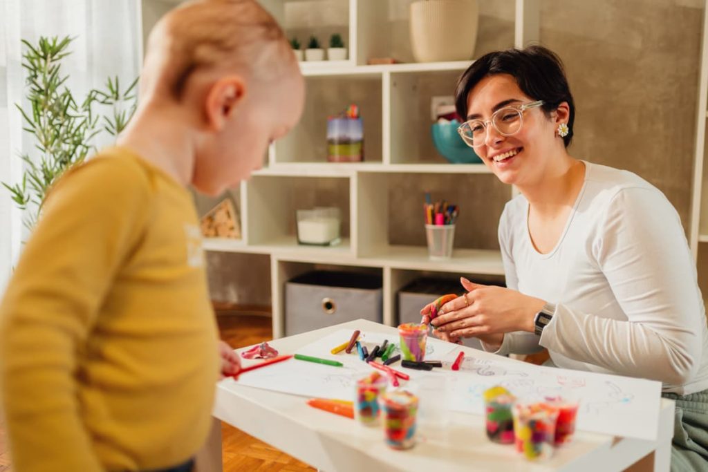 A social worker working with a child in the local community.