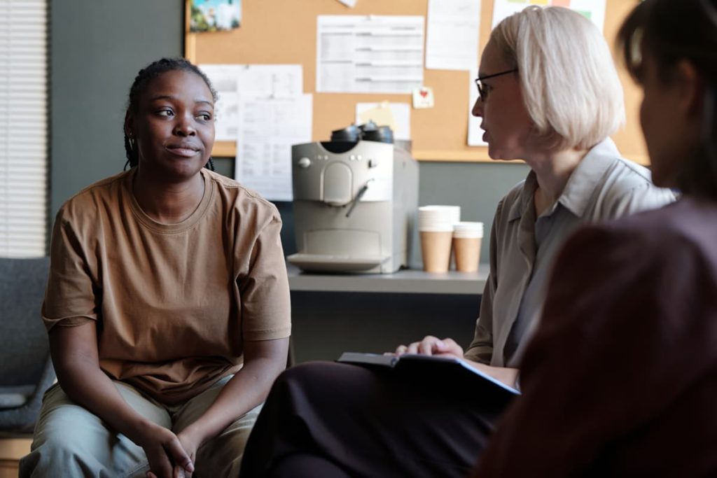 A case manager working with a patient struggling with drug and alcohol abuse.
