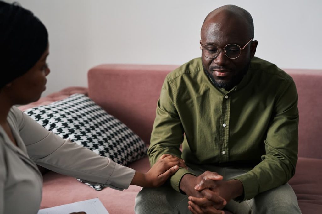 A therapist and patient during a therapy session.