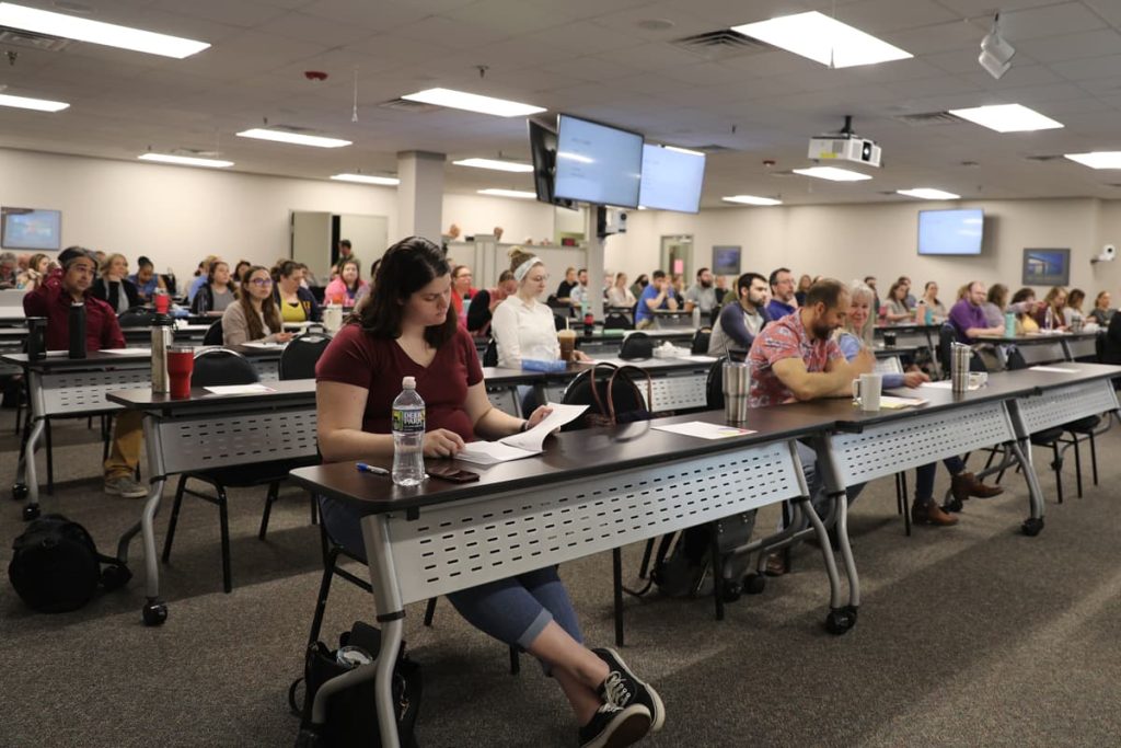A full room of staff at the training center at Pennsylvania counseling services.